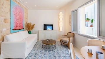 Family Apartment, Multiple Bedrooms (Dimora del Levante Monopoli) | Living area | Flat-screen TV