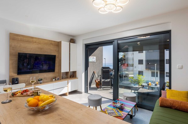 Apartment (Apartment Good Vibes - One Bedroom Ap) | Living room | 32-inch flat-screen TV with cable channels - Apartment Good Vibes (Konavle)