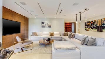 Villa, Garden View | Living area | Flat-screen TV, DVD player