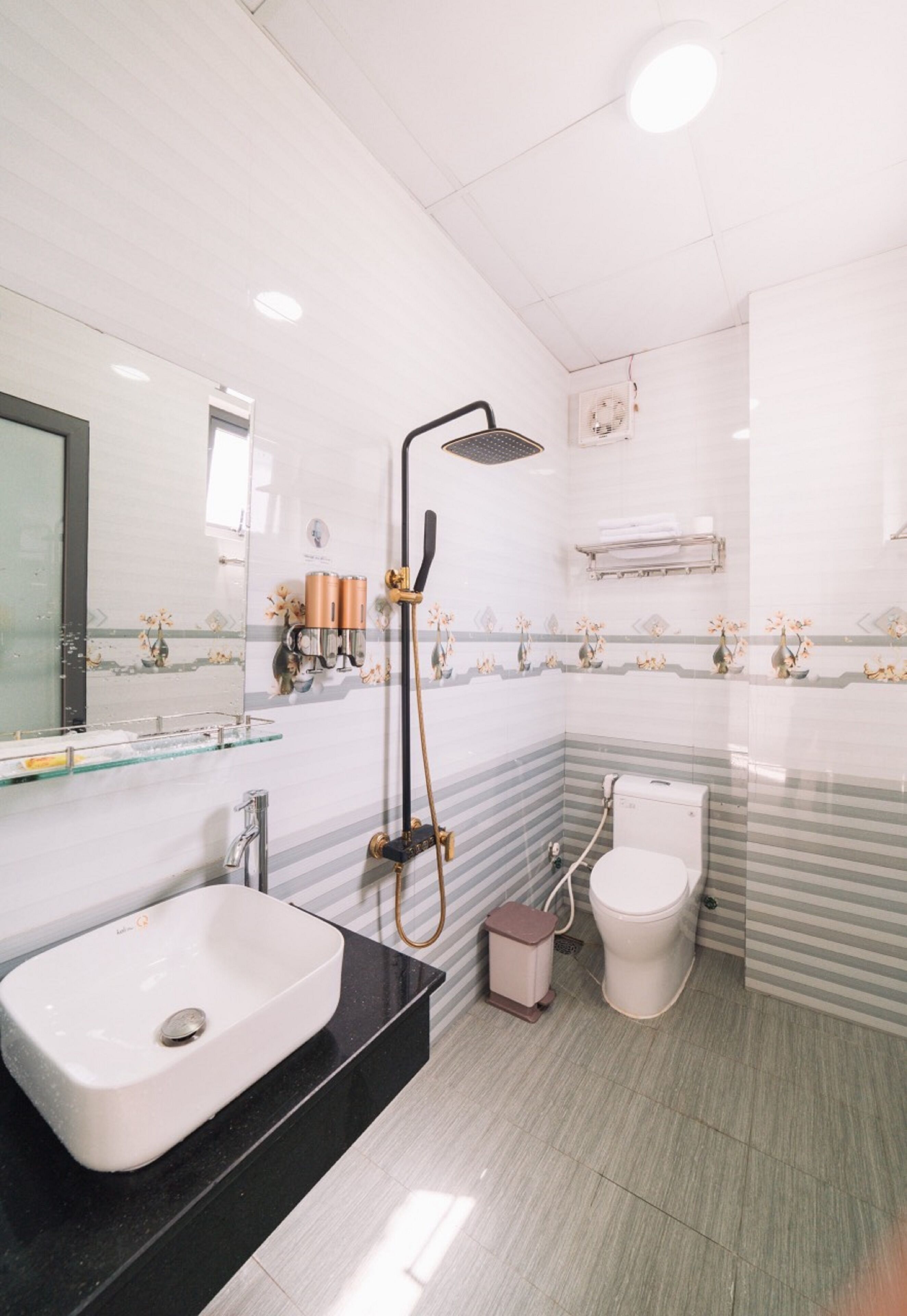 Shower, rainfall showerhead, designer toiletries, hair dryer