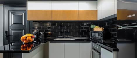 Fridge, microwave, electric kettle, cookware/dishes/utensils