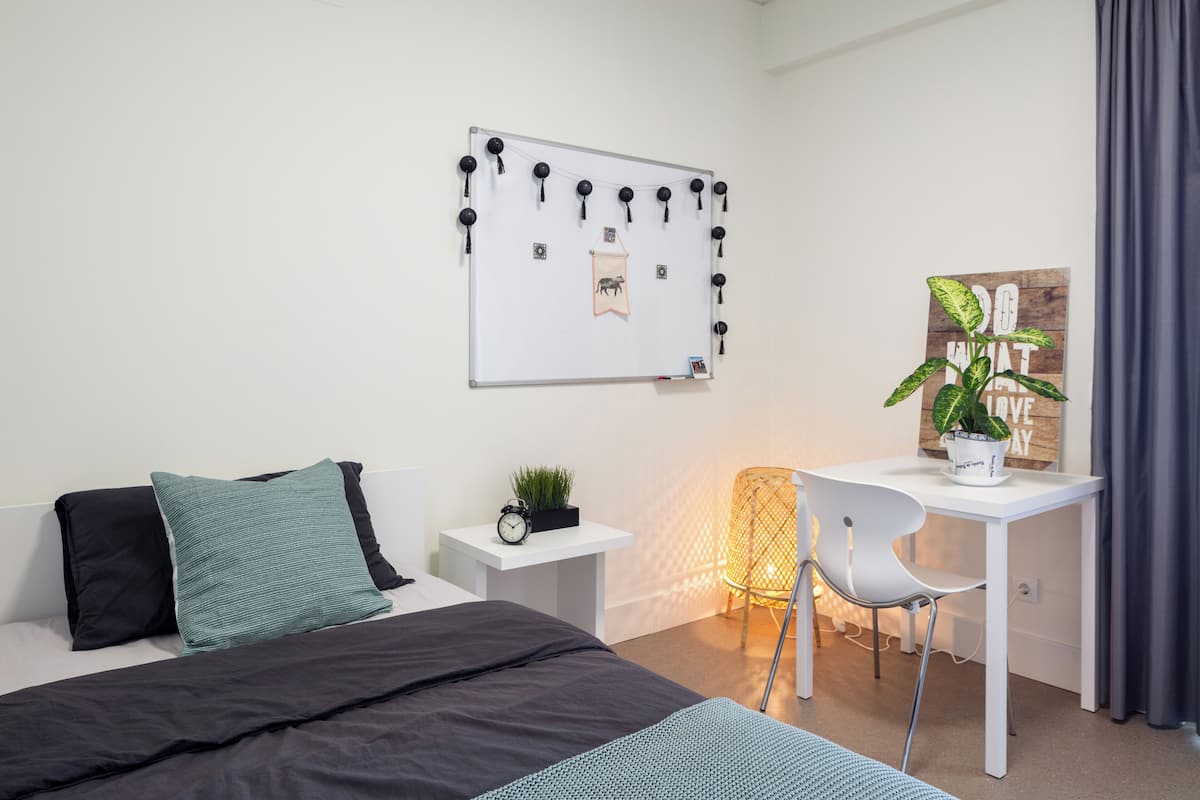 Desk, laptop workspace, free WiFi, bed sheets