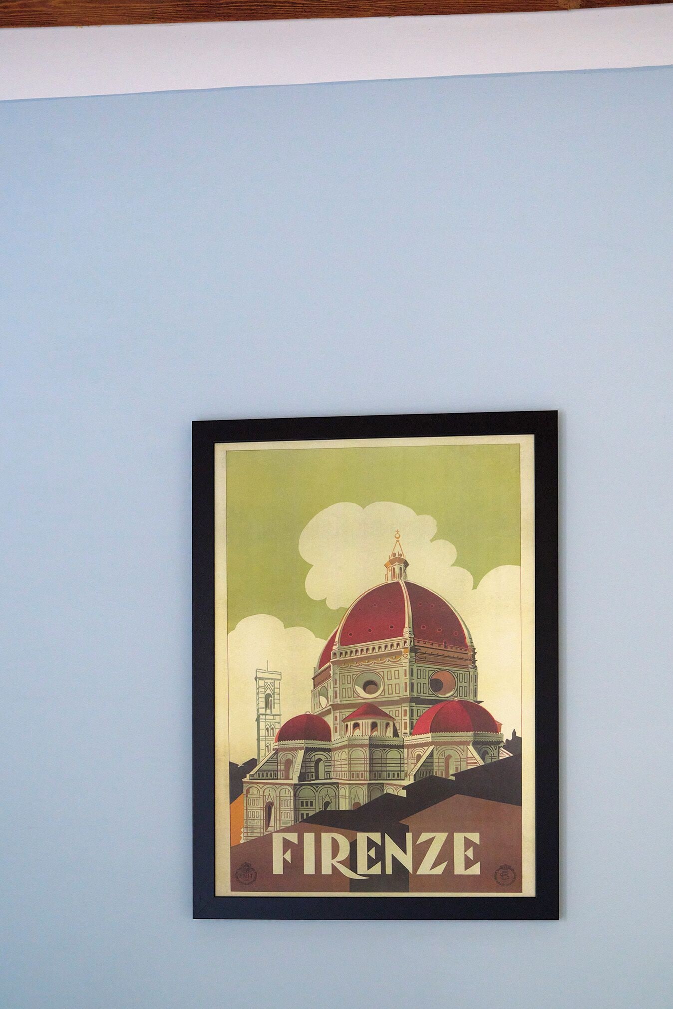 Ilustración enmarco de un edificio con cúpulas y la palabra 'FIRENZE' en la parte inferior.