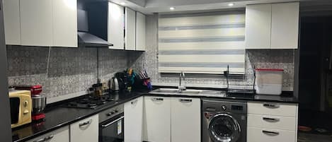 Fridge, oven, coffee grinder
