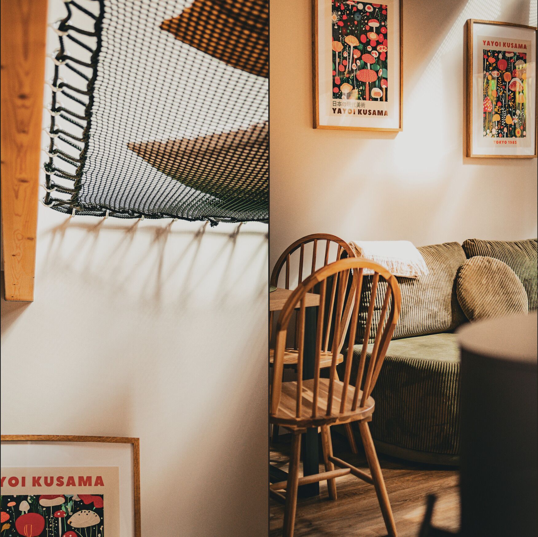 Ein Zimmer mit einem Holzhocker, einer Couch und einem gerahmten Bild an der Wand.