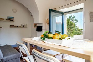 Apartment | Living area | 35-inch TV with satellite channels - Loft Sole by Wonderful Italy (Giarre)