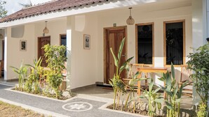 Standard Room, Garden View | Balcony - Nucifera Kuta Lombok (Kuta)