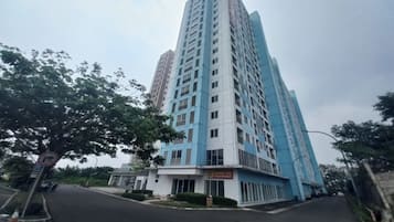 A tall, modern building with a sign reading "NIKITA".