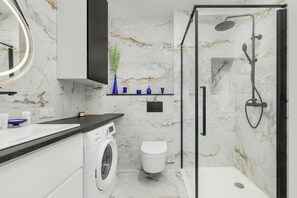 Apartment, 1 Bedroom, Balcony | Bathroom | Shower, towels, soap, shampoo - Bright Apartment for 4 People by Renters (Dziwnów)