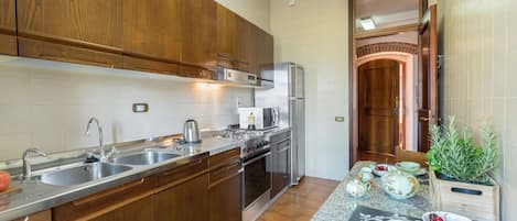 Apartment, City View | Private kitchen | Full-size fridge, microwave, oven, espresso maker