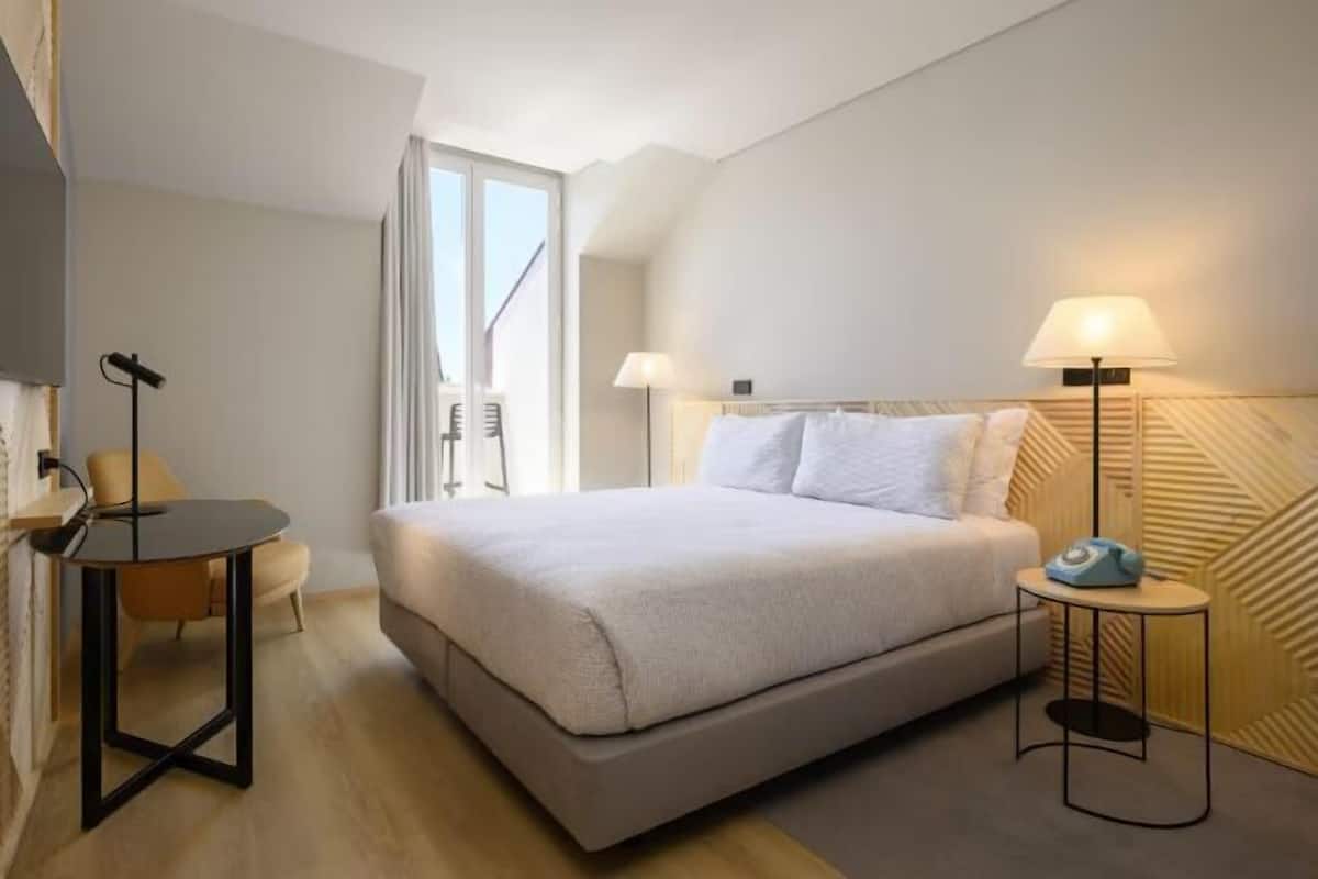 1 chambre, minibar, bureau, fer et planche Ă repasser