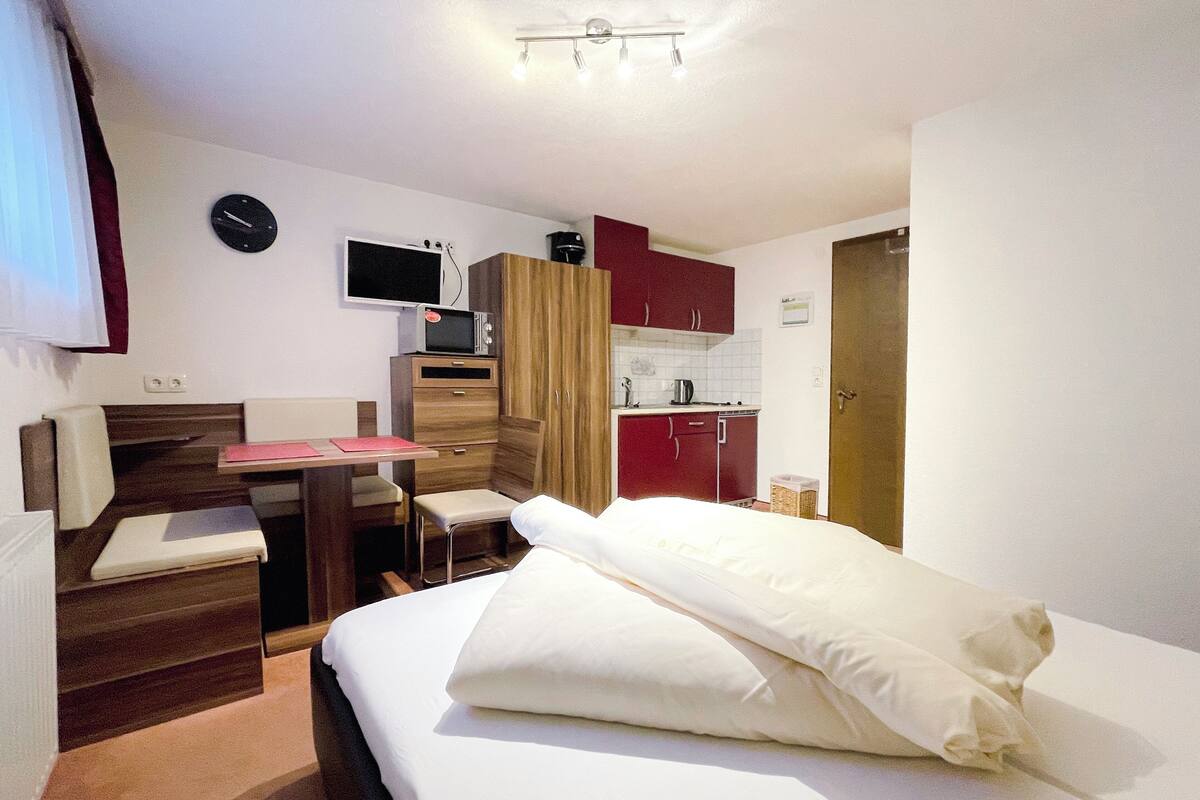 Standard Apartment | Living area | Flat-screen TV