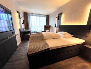 舒适单人房 | 客房内保险箱�、遮光窗帘、隔音、免费 WiFi