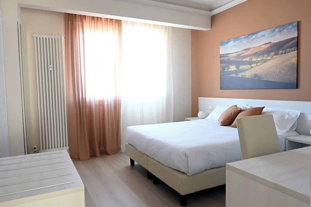 Premium bedding, down duvets, in-room safe, individually decorated