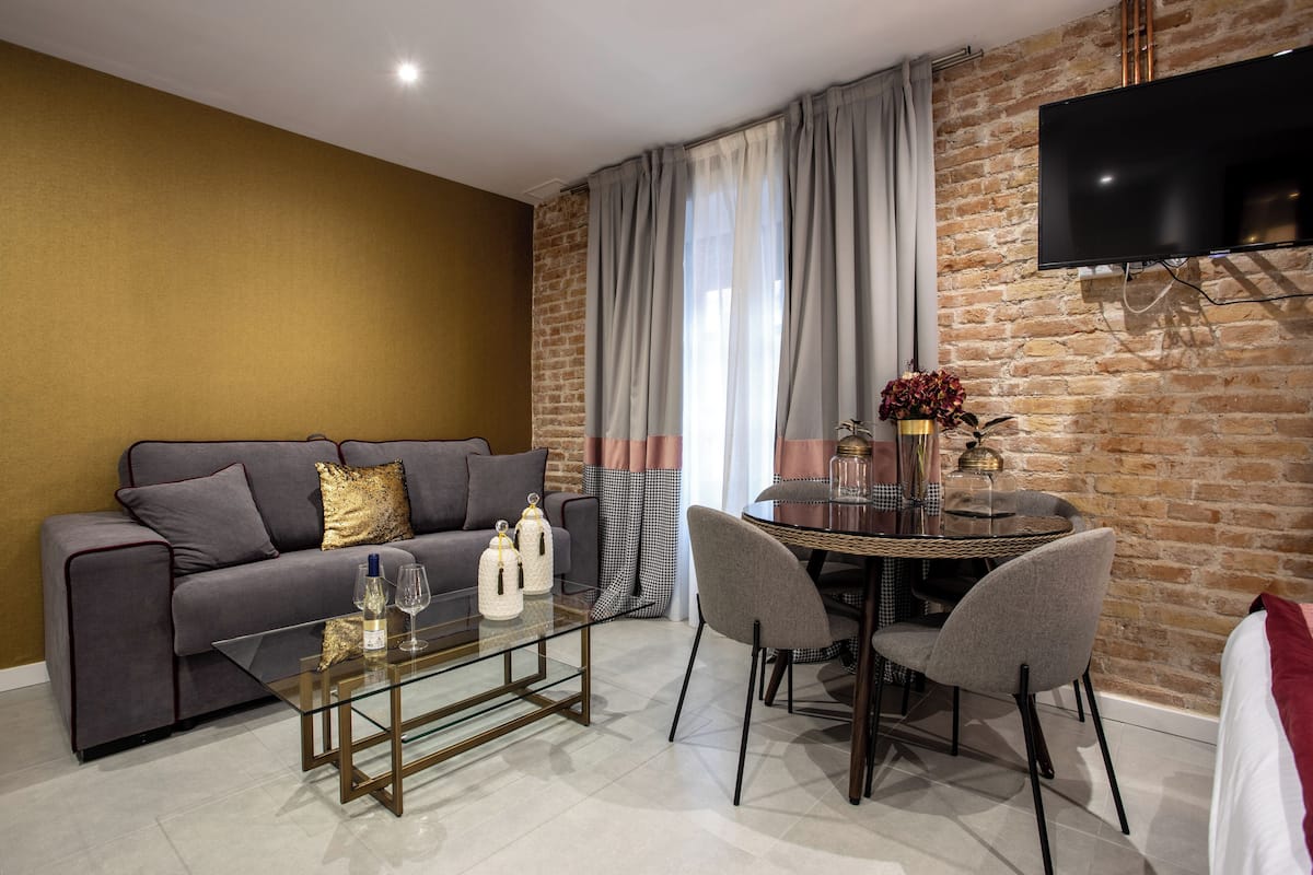 Standard Studio | Living area | 46-inch flat-screen TV with digital channels