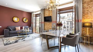 Superior Apartment, 2 Bedrooms | Living area | 46-inch flat-screen TV with digital channels