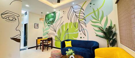 Casa Deluxe | Zona de estar | Una televisión de pantalla plana