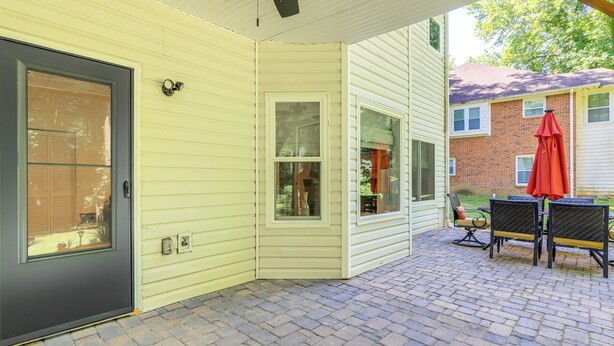 A covered patio with a brick floor, a door, and a window. - Cozy Jonesboro Studio w/ Patio ~ 22 Mi to Atlanta! (Jonesboro)