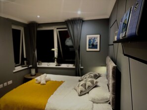 2 slaapkamers, een strijkplank/strijkijzer, gratis wifi, beddengoed