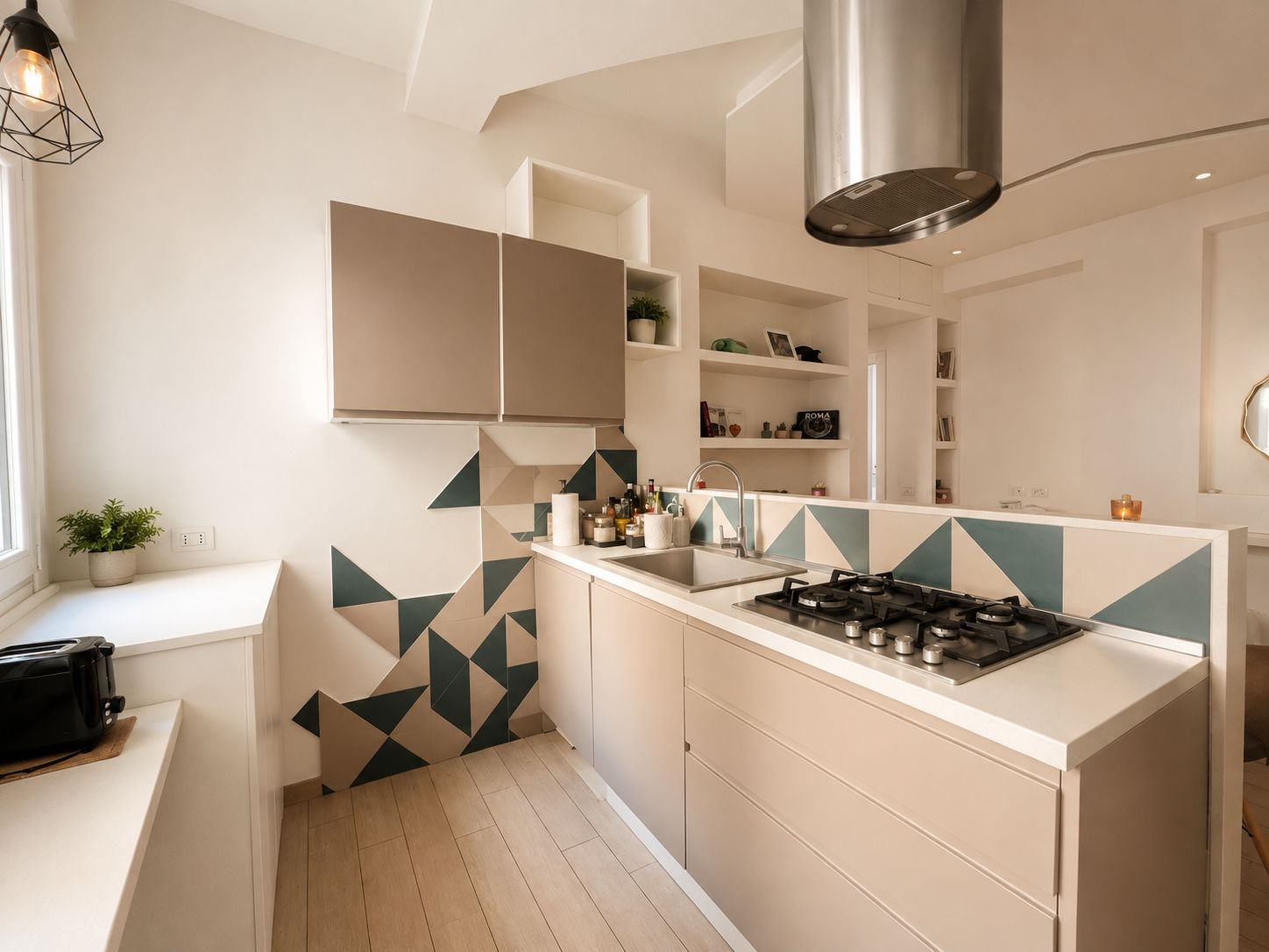 A modern kitchen with a built-in gas stove, white cabinetry, and a geometric backsplash.