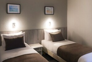 Family Room | Premium bedding, in-room safe, desk, laptop workspace