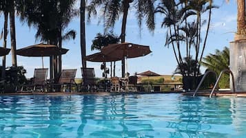 Indoor pool, 2 outdoor pools, open 10:00 AM to 10:00 PM, pool umbrellas