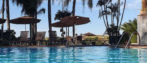 Indoor pool, 2 outdoor pools, open 10:00 AM to 10:00 PM, pool umbrellas