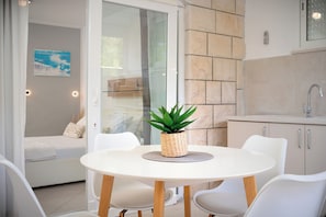 Studio, Terrace, Beachfront | Dining room