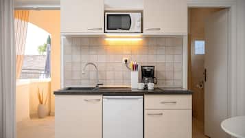 Estúdio, vista para o mar, de frente para a praia | Cozinha privada | Frigobar, cadeirão de bebê, talheres/pratos/utensílios de cozinha