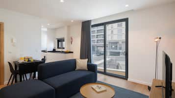 Basic Apartment, 1 Queen Bed with Sofa bed | Living area | TV