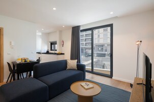 Basic Apartment, 1 Queen Bed with Sofa bed | Living area | TV