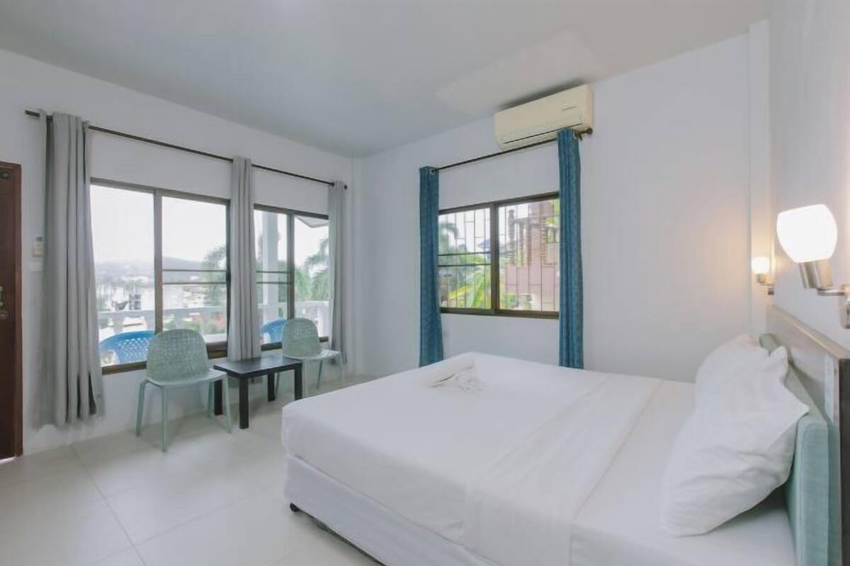1 bedroom, blackout drapes, soundproofing, iron/ironing board