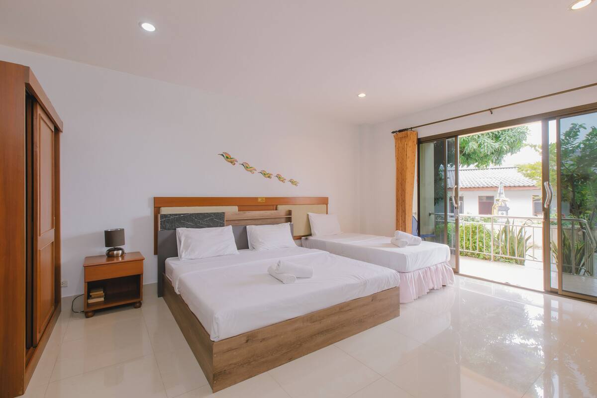Triple studio kitchenette with balcony | Laptop workspace, blackout drapes, soundproofing
