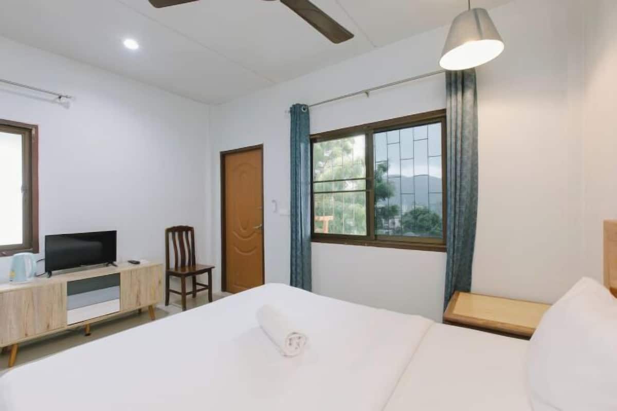 1 bedroom, blackout drapes, soundproofing, iron/ironing board