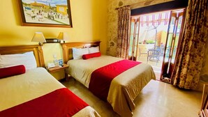 Family Suite, Balcony, City View | In-room safe, desk, laptop workspace, blackout drapes - Cancun International by ZEIVA (Cancun)