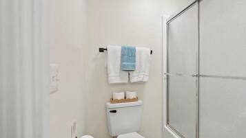 Hair dryer, towels, soap, toilet paper