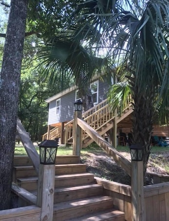 Property grounds. Charming waterfront barndominium on the beautiful spring-fed Chipola River.