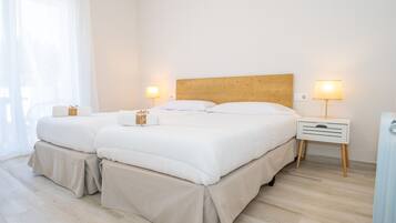 4 dormitorios, tabla de planchar con plancha, wifi gratis y ropa de cama