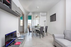 Apartment, Balcony | Living area | 35-inch TV with digital channels - Contemporary apartment in Sturla by Wonderful Italy (Genoa)