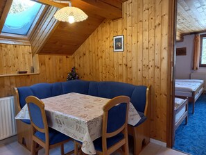 Family Apartment, Mountain View | Living area | Flat-screen TV