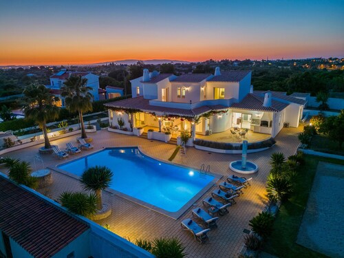 Modern villa with heatable pool and barbecue