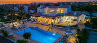 Modern villa with heatable pool and barbecue