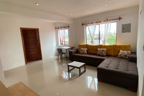 Apartamento luxo, vista para a cidade | Área de estar