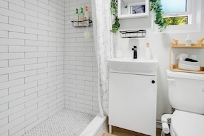 Eco-friendly toiletries, hair dryer, towels, soap