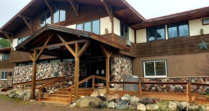 A fun fishing themed private guestroom for up to 5 inside the Lodge at North Ironwood Acres resort. TWO bathrooms! DOG FRIENDLY!!.