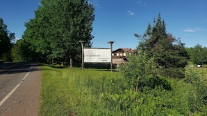 A sign for North Ronwood Acres, a family-owned and operated farm.