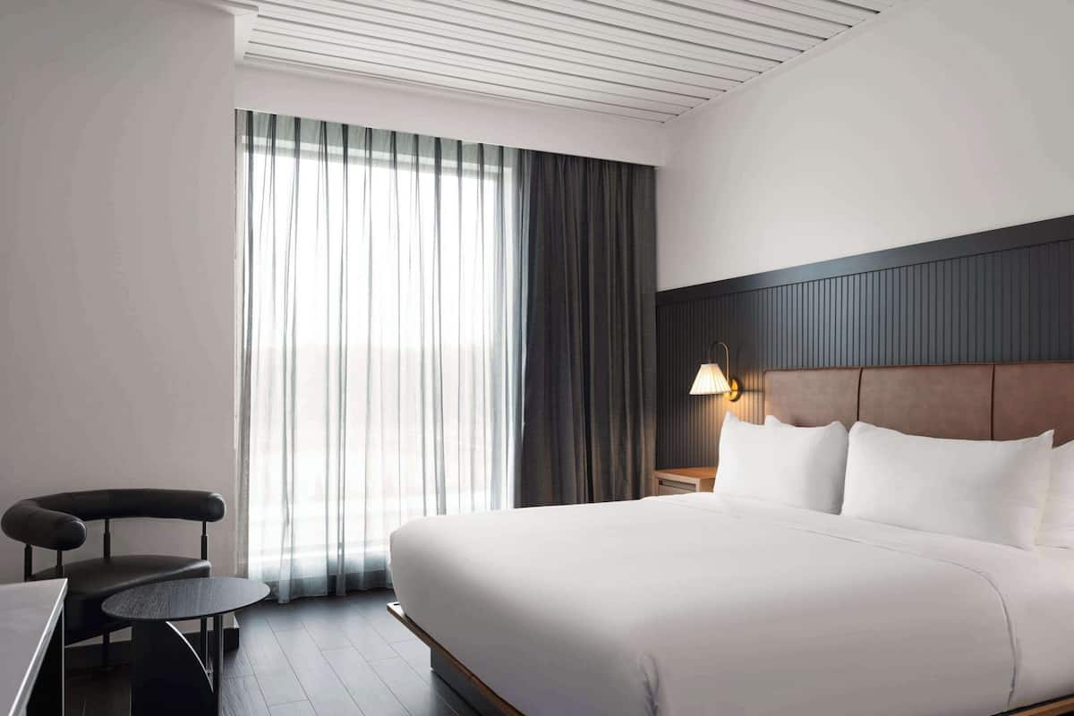 Room, 1 King Bed, Accessible (Mobility, Roll-in Shower) | Laptop workspace, blackout drapes, free WiFi, bed sheets