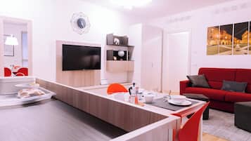 Apartamento | Área de estar | TV de tela plana 35 cm com canais digitais