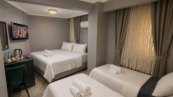 Deluxe Dört Kisilik Oda - Kahvalti Dahil | Egyptian cotton sheets, premium bedding, down comforters