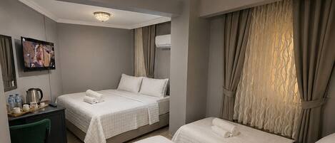 Deluxe Dört Kisilik Oda - Kahvalti Dahil | Lakens van Egyptisch katoen, luxe beddengoed, donzen dekbedden